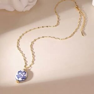 Blue and White Floral Ceramic Pendant on Stainless Steel Necklace